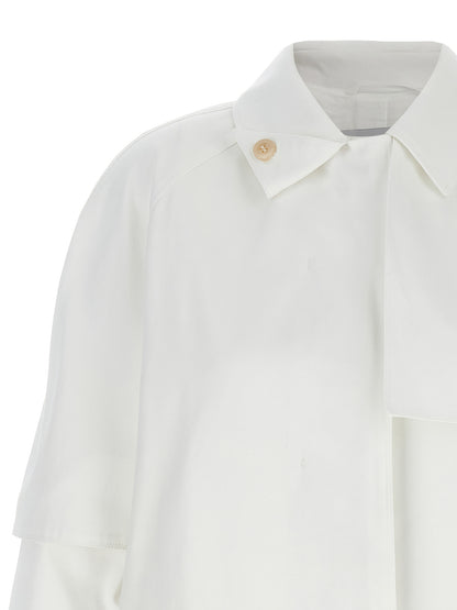 Trench Coat by Max Mara for women in cotton and white presents a exquisite silhouette, showcasing a exquisite shirt-collar neckline and functional water-resistant & pockets for an elevated aesthetic.