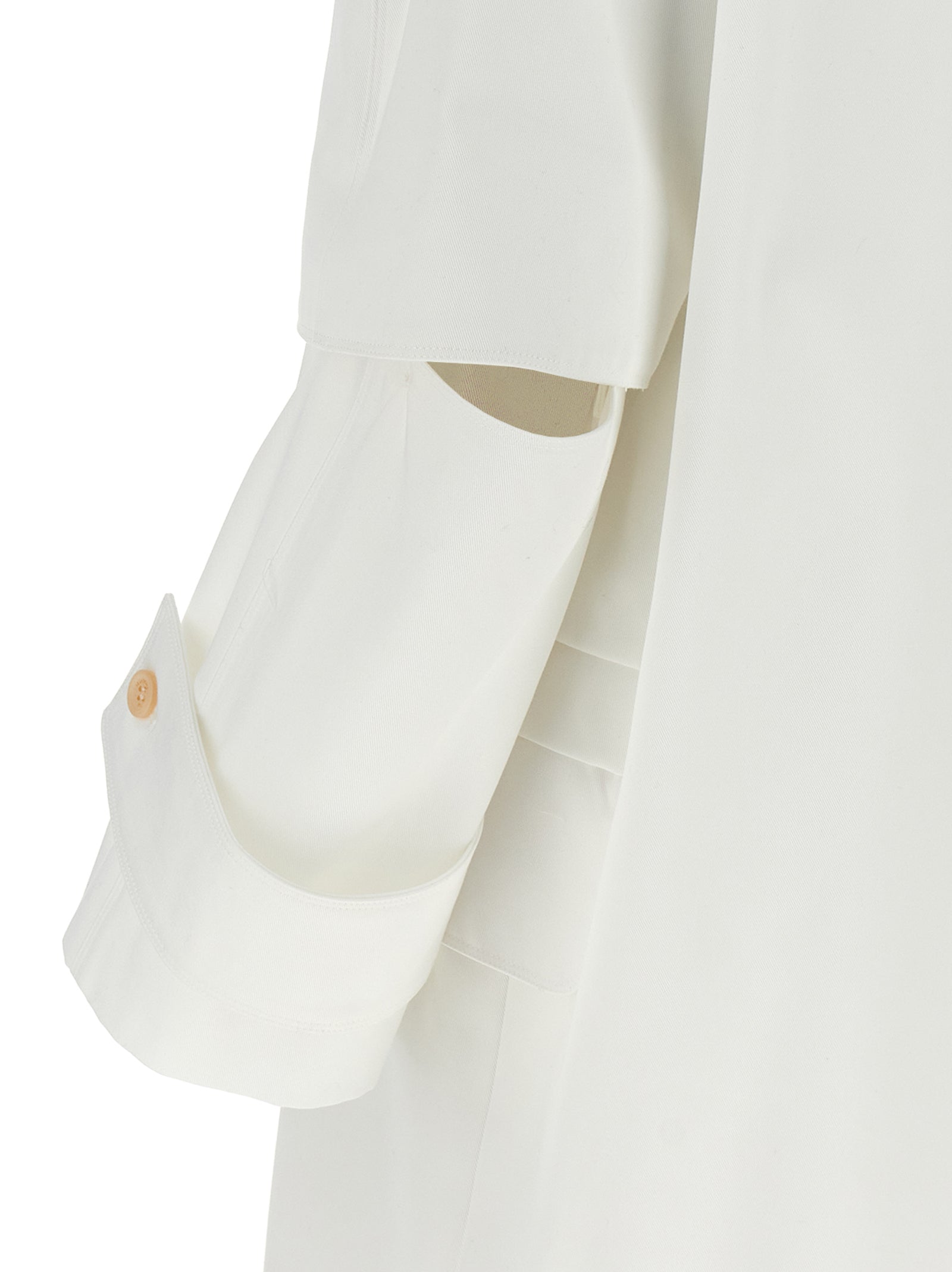 Trench Coat by Max Mara for women in cotton white features an dramatic silhouette, perfectly showcasing the elegant and sophisticated water-resistant & pockets for a truly dramatic aesthetic.