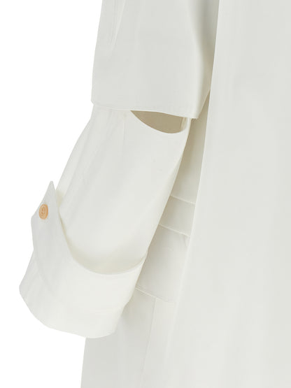 Trench Coat by Max Mara for women in cotton white features an dramatic silhouette, perfectly showcasing the elegant and sophisticated water-resistant & pockets for a truly dramatic aesthetic.