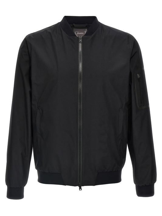 Bomber Jacket by Herno for men in polyester black features an contemporary silhouette, showcasing a sophisticated and contemporary breathable-design, windproof & pockets for a truly refined look.