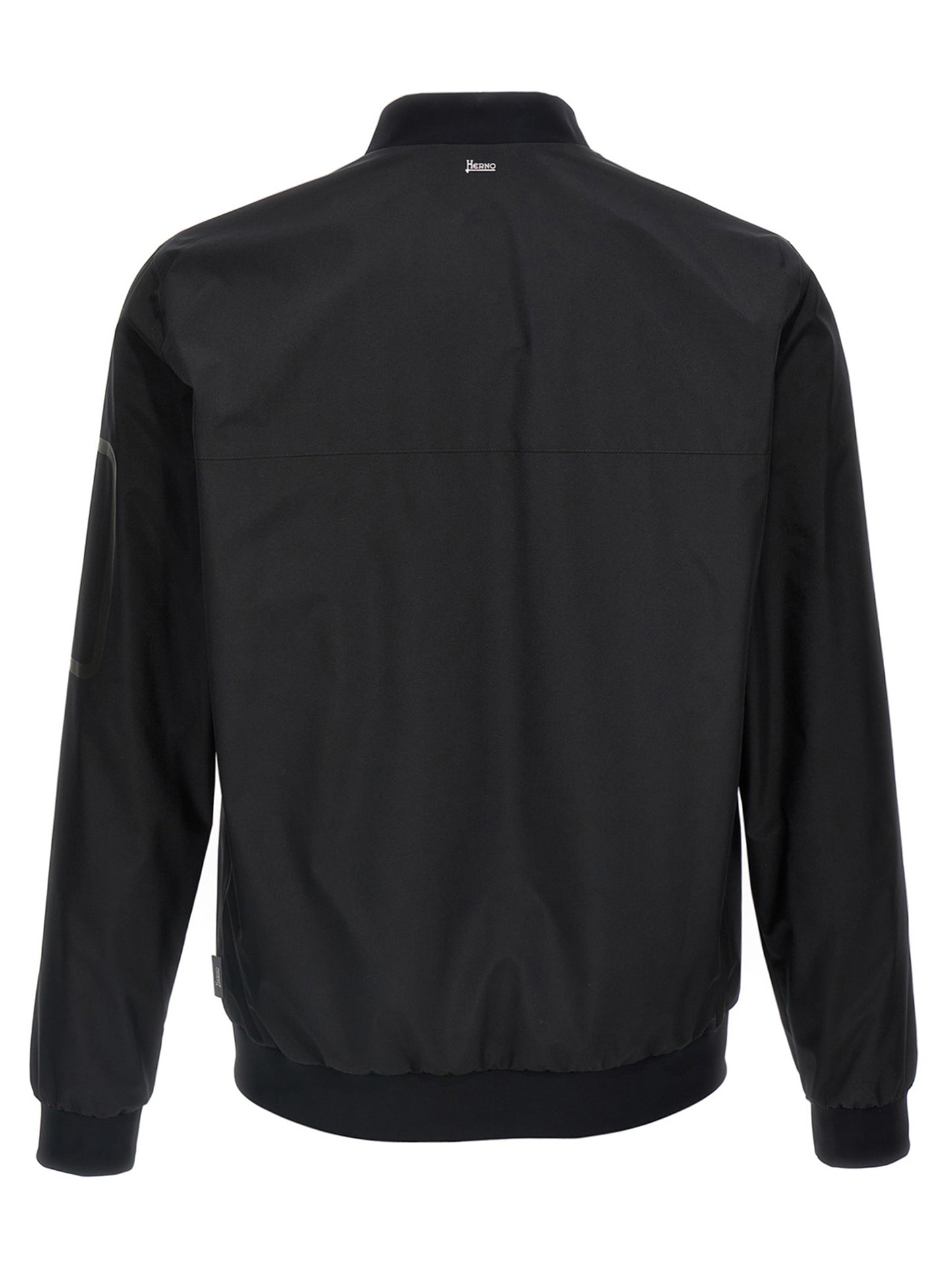 This Bomber Jacket by Herno for men in polyester black exhibits a edgy silhouette, meticulously detailed with functional breathable-design, windproof & pockets and a edgy for a edgy finish.
