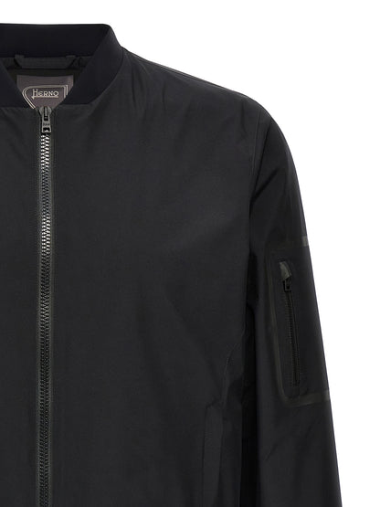 Bomber Jacket by Herno for men in polyester black presents a effortlessly chic silhouette, showcasing a sophisticated and premium breathable-design, windproof & pockets for a truly effortlessly chic finish.