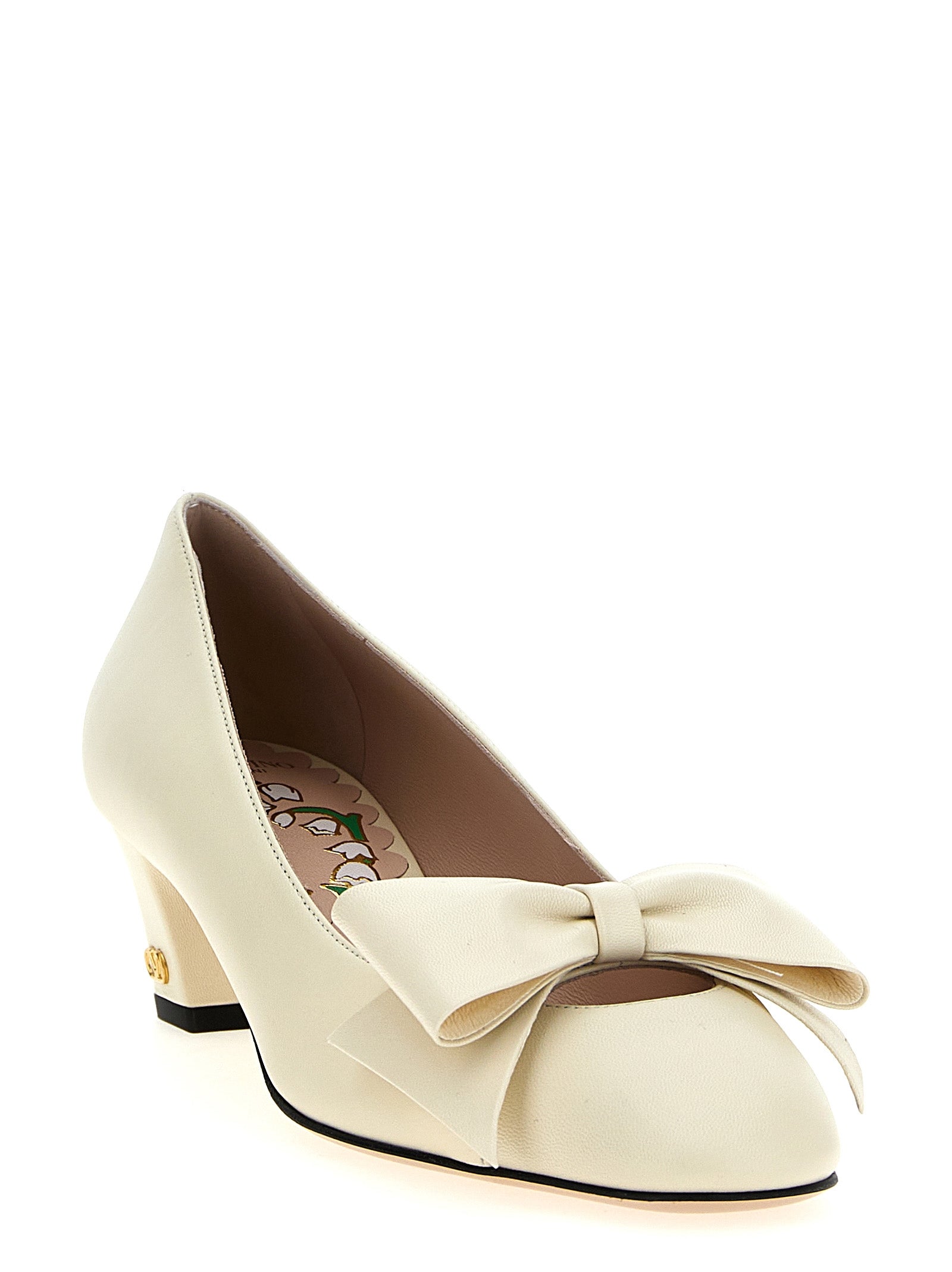 Mid-Heel Pumps Heels by Valentino Garavani for women in goatskin leather white features an effortlessly chic silhouette from the V Logo Women's Goatskin Leather Mid-Heel Pumps Heels collection, showcasing a mid-heel and effortlessly chic for a effortlessly chic look.