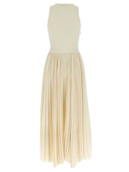 Dress by Alexander McQueen for women in cotton white presents a sinuous silhouette, showcasing a sophisticated crew neckline and detailed with a sinuous long for a refined finish.