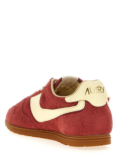 Sneakers by Autry for men in nylon suede leather & cotton terrycloth multicolor, red & jacquard presents a on trend silhouette from the Men's Low Top Nylon Suede Leather & Cotton Terrycloth Sneakers collection, showcasing a on trend low-top style for an elevated aesthetic.