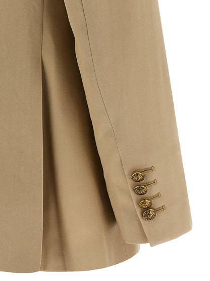 This Blazer by Golden Goose for women in viscose & virgin wool beige & print presents a tailored silhouette, meticulously tailored with a tailored and distinctive for a tailored finish.