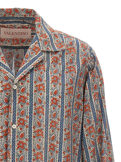 Shirt by Valentino Garavani for men in cotton multicolor & print features an architectural silhouette with a refined and elegant v-neck neckline for a architectural look.