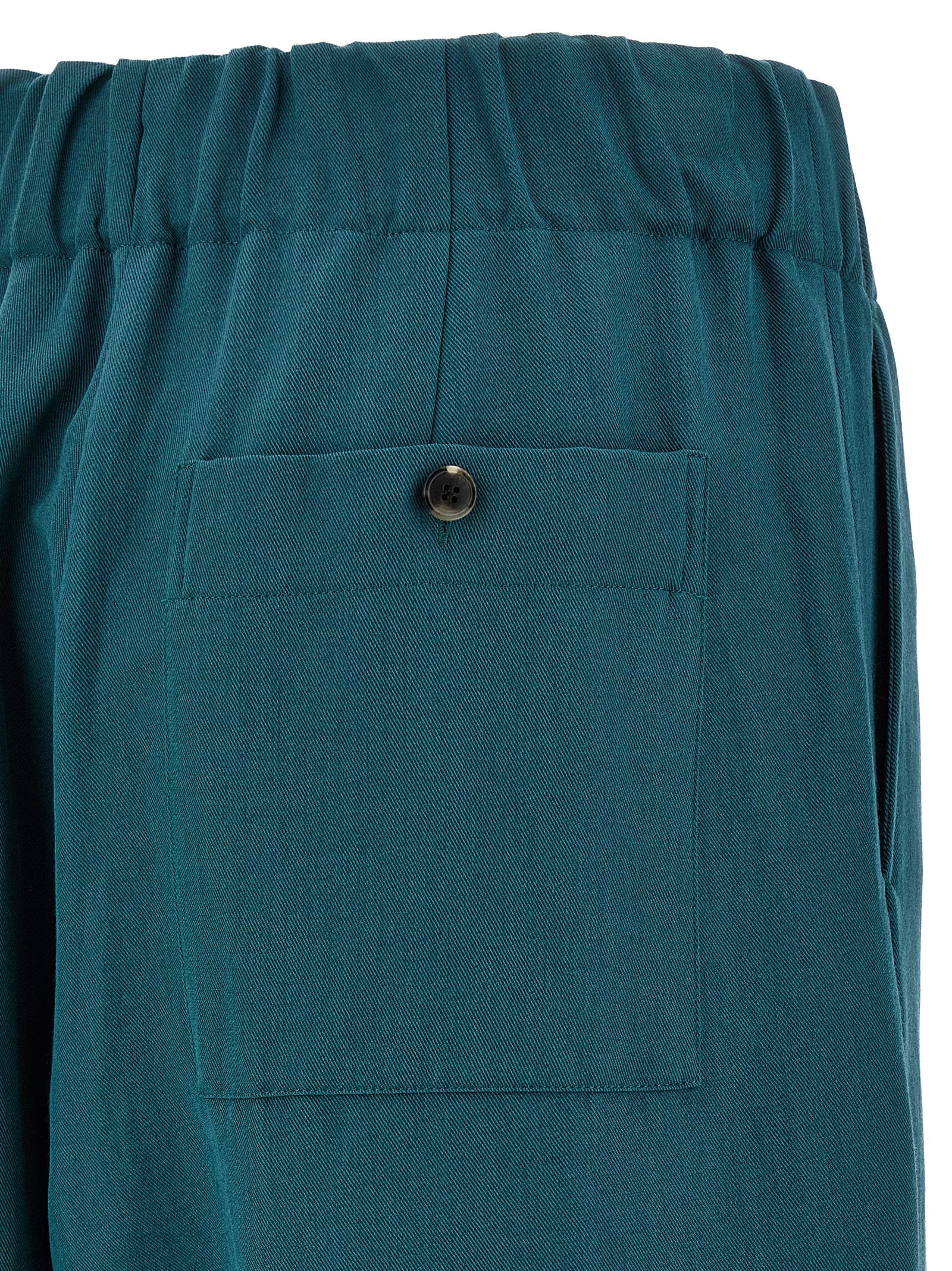 Casual Pants by Dries Van Noten for women in polyamide polyester & wool bicolour & green features a refined silhouette with a refined , defined by a and a refined long for a refined finish.