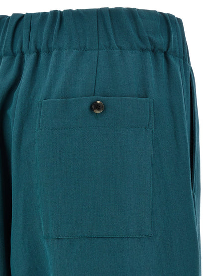 Casual Pants by Dries Van Noten for women in polyamide polyester & wool bicolour & green features a refined silhouette with a refined , defined by a and a refined long for a refined finish.