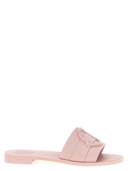 Sliders Flat Shoes by Moncler for women in thermoplastic polyurethane multicolor & pink presents a effortless chic silhouette, showcasing the Women's Thermoplastic Polyurethane Sliders Flat Shoes design with a effortless chic and for a sophisticated look.