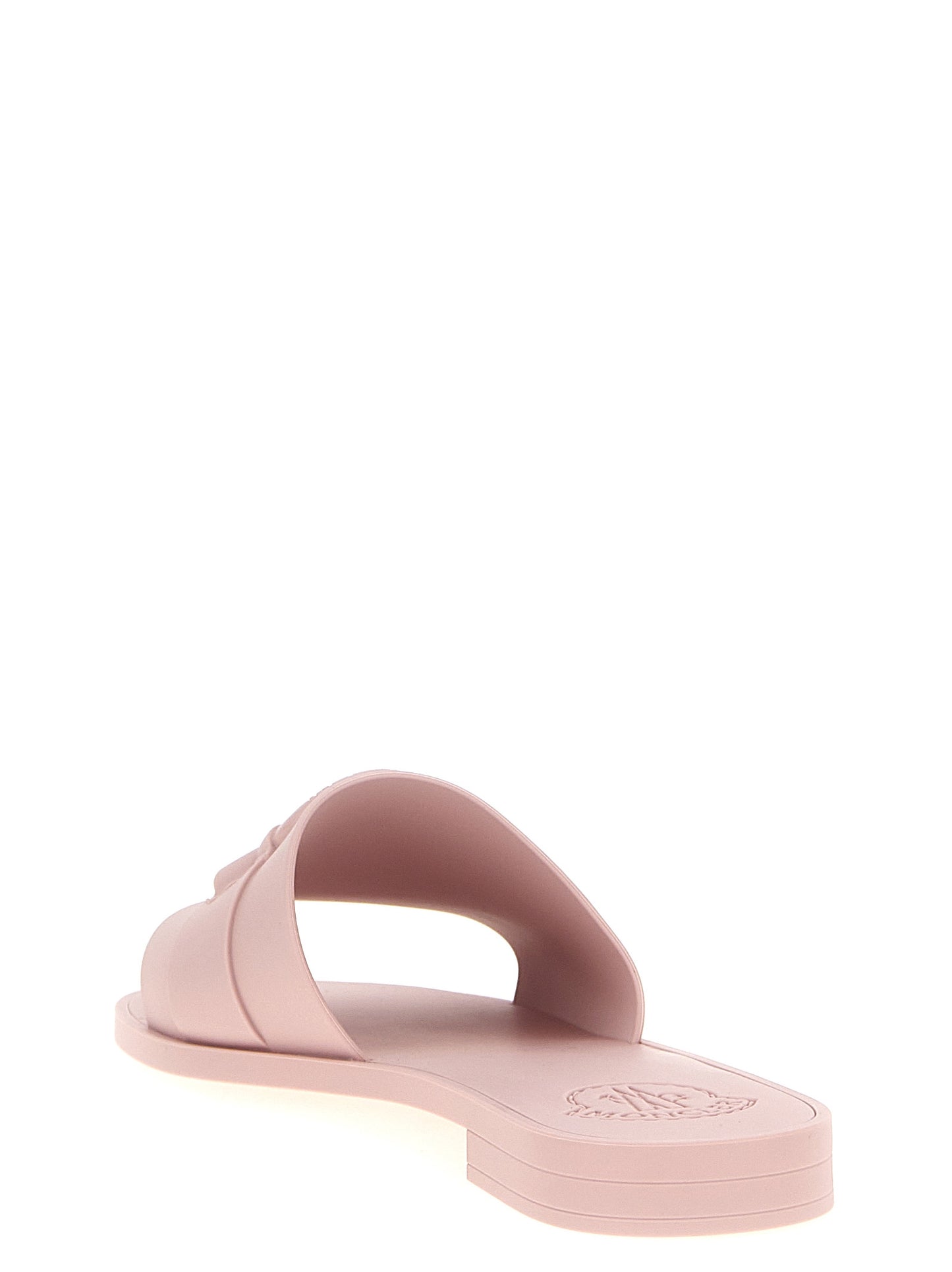 Sliders Flat Shoes by Moncler for women in thermoplastic polyurethane multicolor & pink features an captivating silhouette, showcasing the captivating style of the Women's Thermoplastic Polyurethane Sliders Flat Shoes with its distinct and refined .