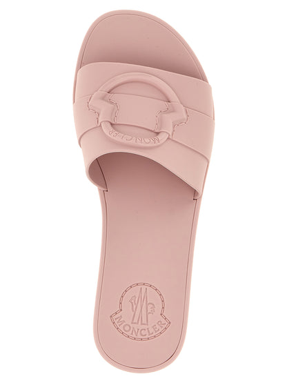 Sliders Flat Shoes by Moncler for women in thermoplastic polyurethane multicolor & pink showcases a enchanting silhouette as part of the Women's Thermoplastic Polyurethane Sliders Flat Shoes collection, defined by a enchanting and for a enchanting look.