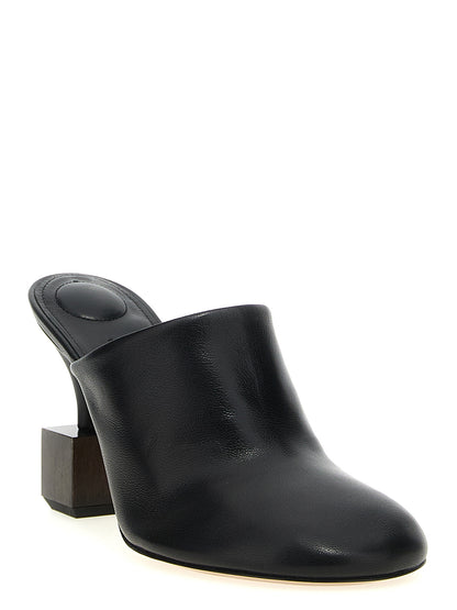 High-Heel Mules Pumps Heels by Jacquemus for women in lamb leather black features a effortlessly chic Bisou Women's Lamb Leather High-Heel Mules Pumps Heels design with a sophisticated high-heel and elegant .