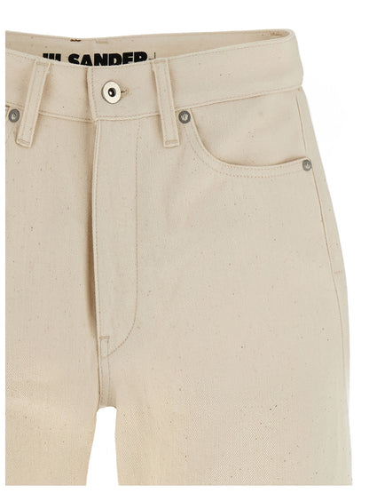 Jeans by Jil Sander for women in cotton denim beige features a polished silhouette with a polished cropped, reaching a polished cropped and finished with a polished high rise.