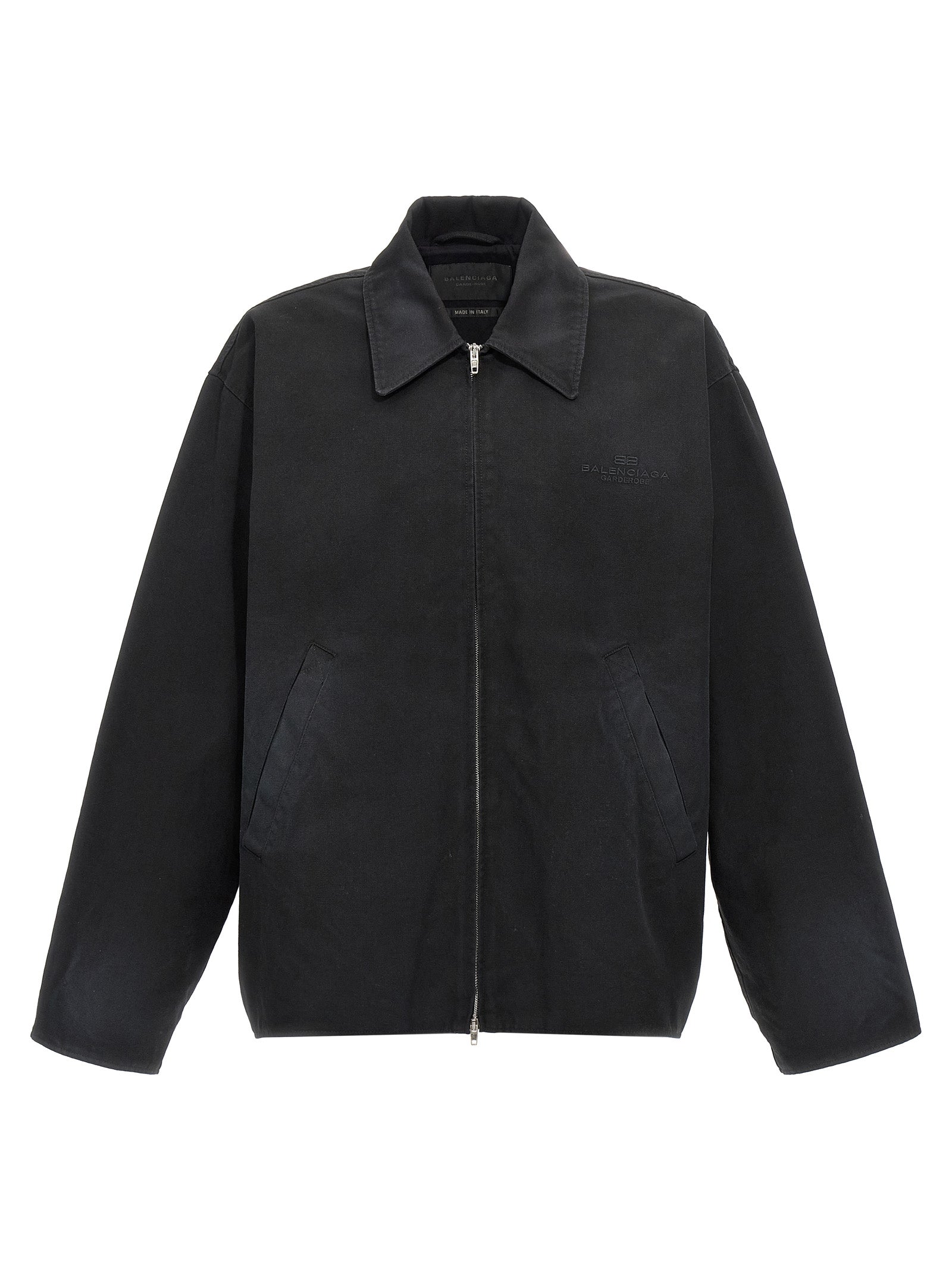 Overcoat by Balenciaga for men in cupro & cotton black showcases a enveloping silhouette, detailed with distinctive pockets and a enveloping .