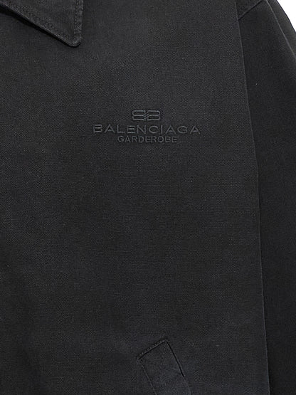 Overcoat by Balenciaga for men in cupro & cotton black features an satoral silhouette, showcasing a sophisticated and satoral pockets for a premium, timeless look.