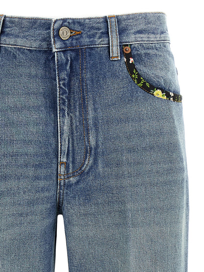 Jeans by Valentino Garavani for women in cotton denim blue & floral presents a tailored silhouette, showcasing a tailored and long cut with a refined for a truly tailored aesthetic.