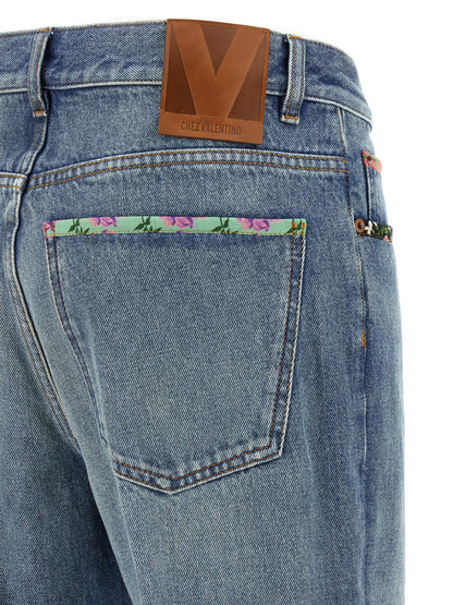 Jeans by Valentino Garavani for women in cotton denim blue & floral features a refined silhouette with a refined , defined by a and a refined long for a refined finish.