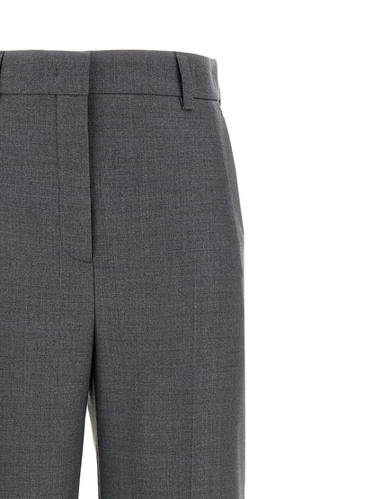 Trousers by Valentino Garavani for women in virgin wool gray features a tailored silhouette with a tailored wide, defined by its long and a sophisticated .