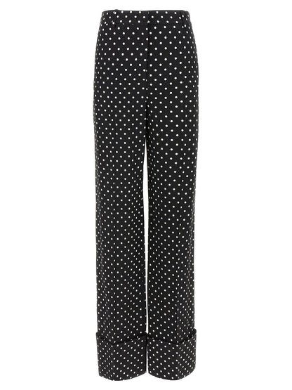 Casual Pants by Valentino Garavani for women in viscose bicolour, black, white & print features a polished silhouette with a polished wide, reaching a polished long and finished with a polished .