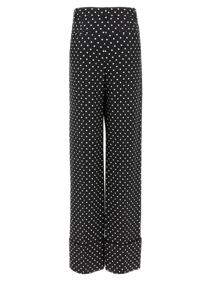 Casual Pants by Valentino Garavani for women in viscose bicolour, black, white & print features an sophisticated and wide with a precise long, creating a sophisticated and sophisticated silhouette.