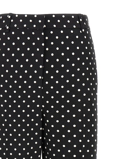 Casual Pants by Valentino Garavani for women in viscose bicolour, black, white & print features an sartorial wide and long with a cut for a sartorial finish.