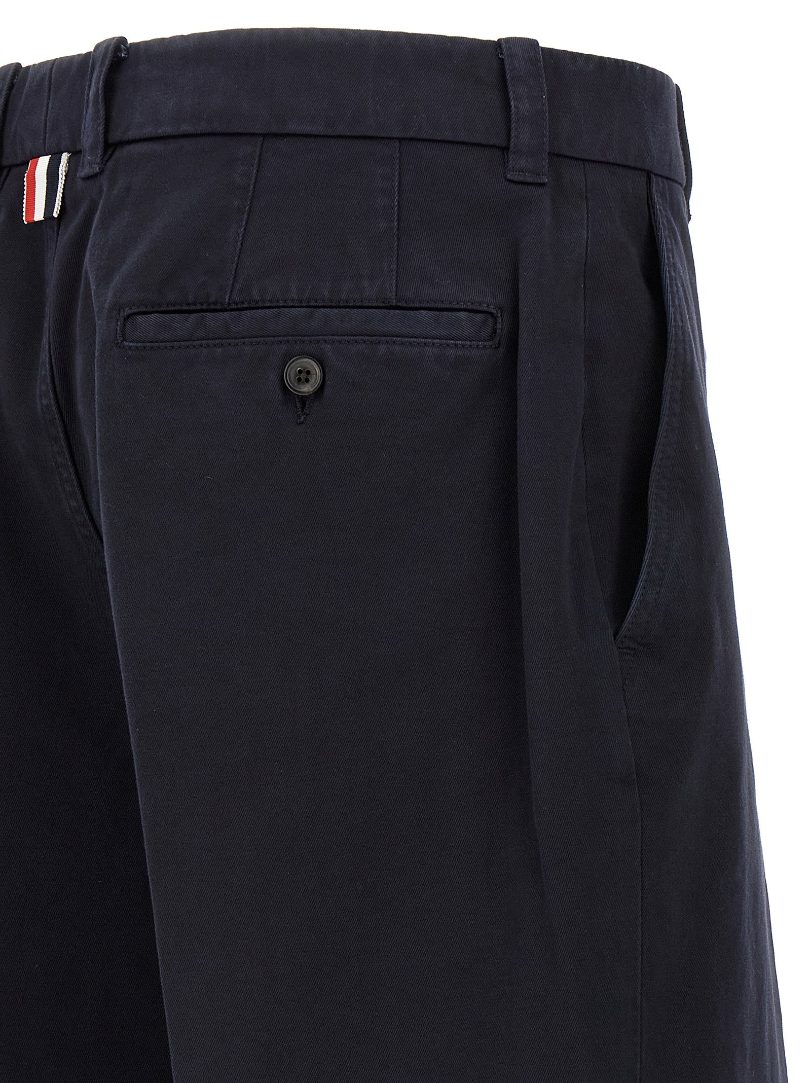 Trousers by Thom Browne for men in cotton blue features an sartorial silhouette, showcasing a precise straight-leg and long with a sartorial for a refined look.