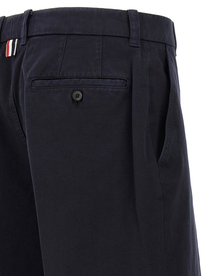 Trousers by Thom Browne for men in cotton blue features an sartorial silhouette, showcasing a precise straight-leg and long with a sartorial for a refined look.