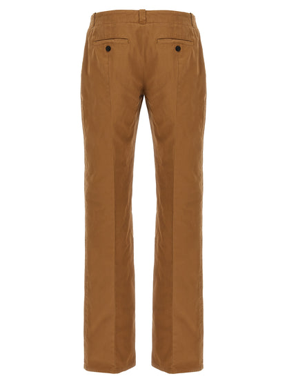 Chinos Pants by Alexander McQueen for men in organic cotton brown features an utilitarian-chic silhouette, showcasing a utilitarian-chic straight-leg with a long cut and low rise for a refined look.