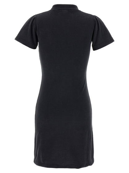 Dress by Balenciaga for women in cotton black showcases a striking silhouette, elegantly detailed with a , refined , and a striking short mini for a striking finish.