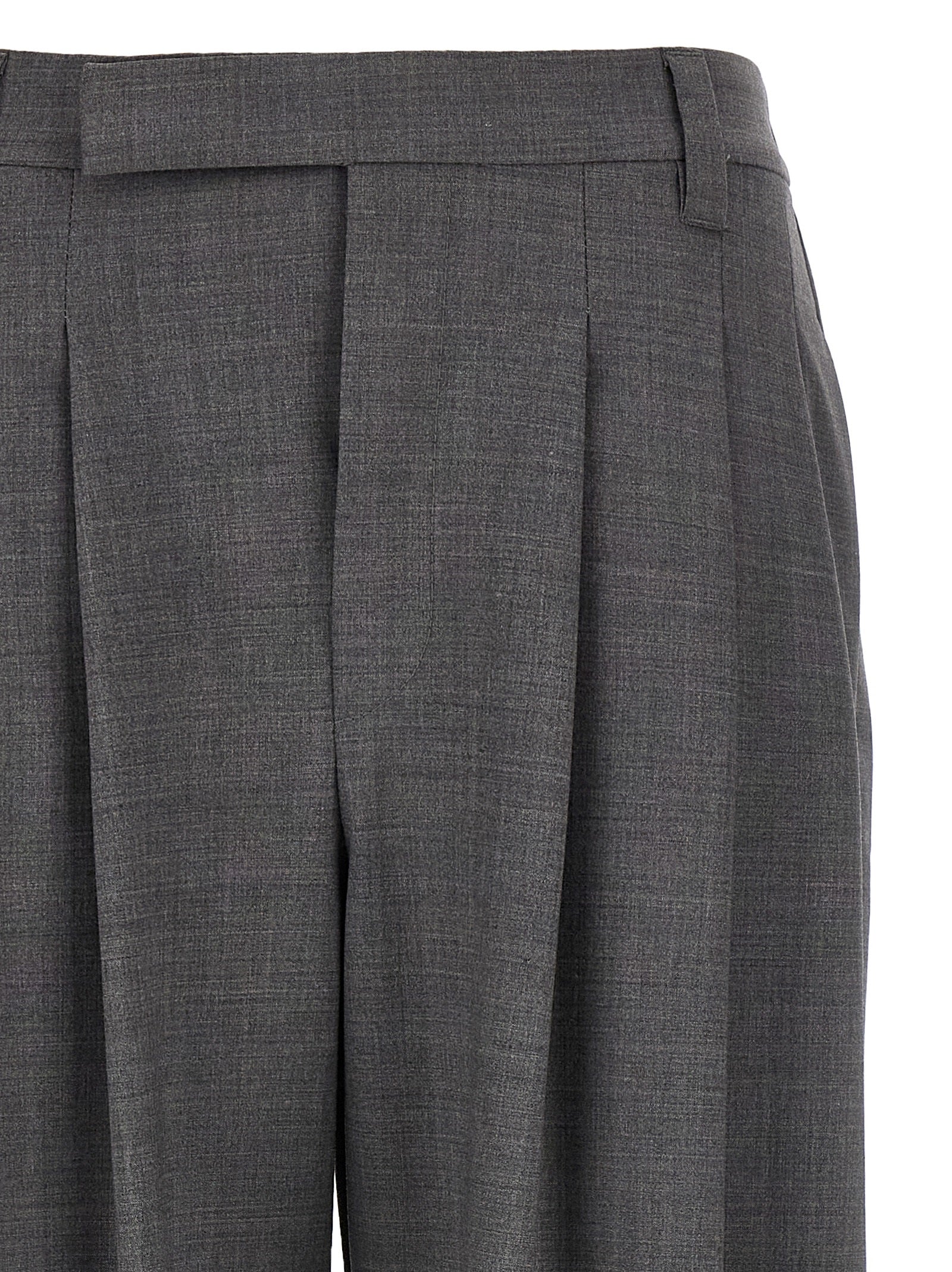 Trousers by Brunello Cucinelli for women in virgin wool & polyamide gray presents a perennial silhouette, meticulously tailored with a wide cut, long finish, and an elegant .