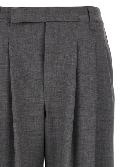 Trousers by Brunello Cucinelli for women in virgin wool & polyamide gray presents a perennial silhouette, meticulously tailored with a wide cut, long finish, and an elegant .