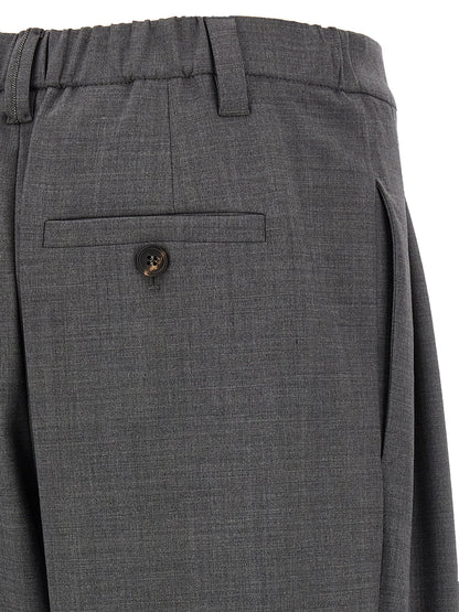 Trousers by Brunello Cucinelli for women in virgin wool & polyamide gray features a tailored silhouette with a tailored wide, defined by its long and a sophisticated .