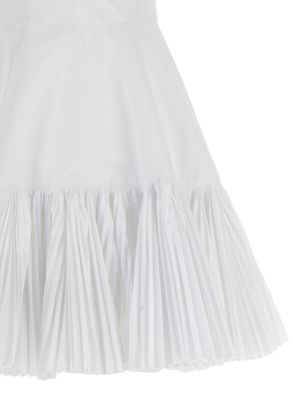 Dress by Giovanni Bedin for women in cotton polyester white features a dramatic silhouette, showcasing an elegant and that flows into a dramatic short mini.
