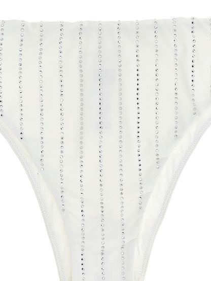 Bikini by MC2 Saint Barth for women in polyamide & rhinestone white presents a provocative silhouette, artfully capturing the essence of the provocative Women's Polyamide & Rhinestone Bikini design for a sophisticated look.