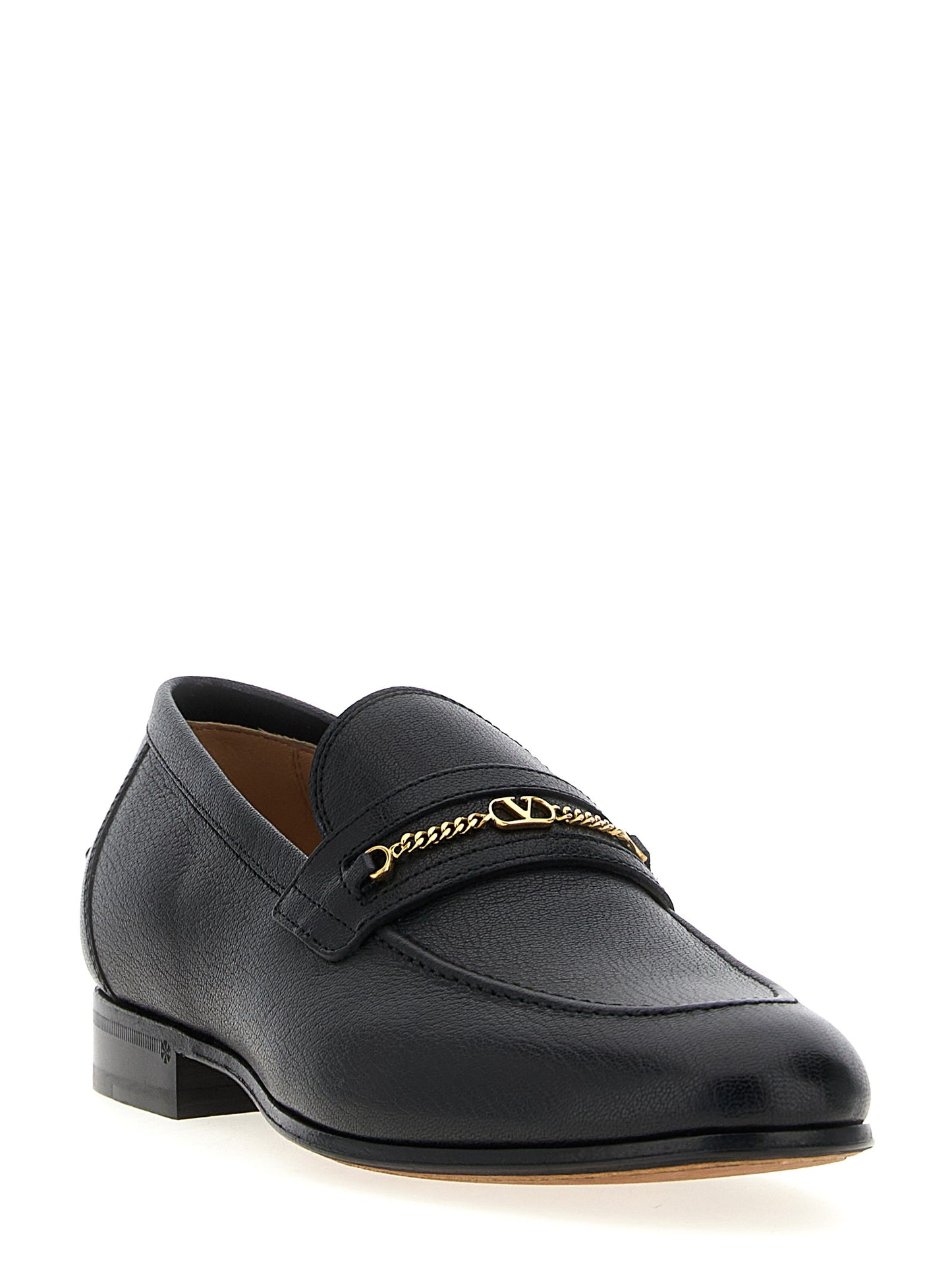 This Loafer Slip-On Shoes by Valentino Garavani for men in goatskin leather black & signature features an exquisite silhouette from the V Logo Men's Goatskin Leather Loafer Slip-On Shoes collection, defined by a sophisticated and elegant .