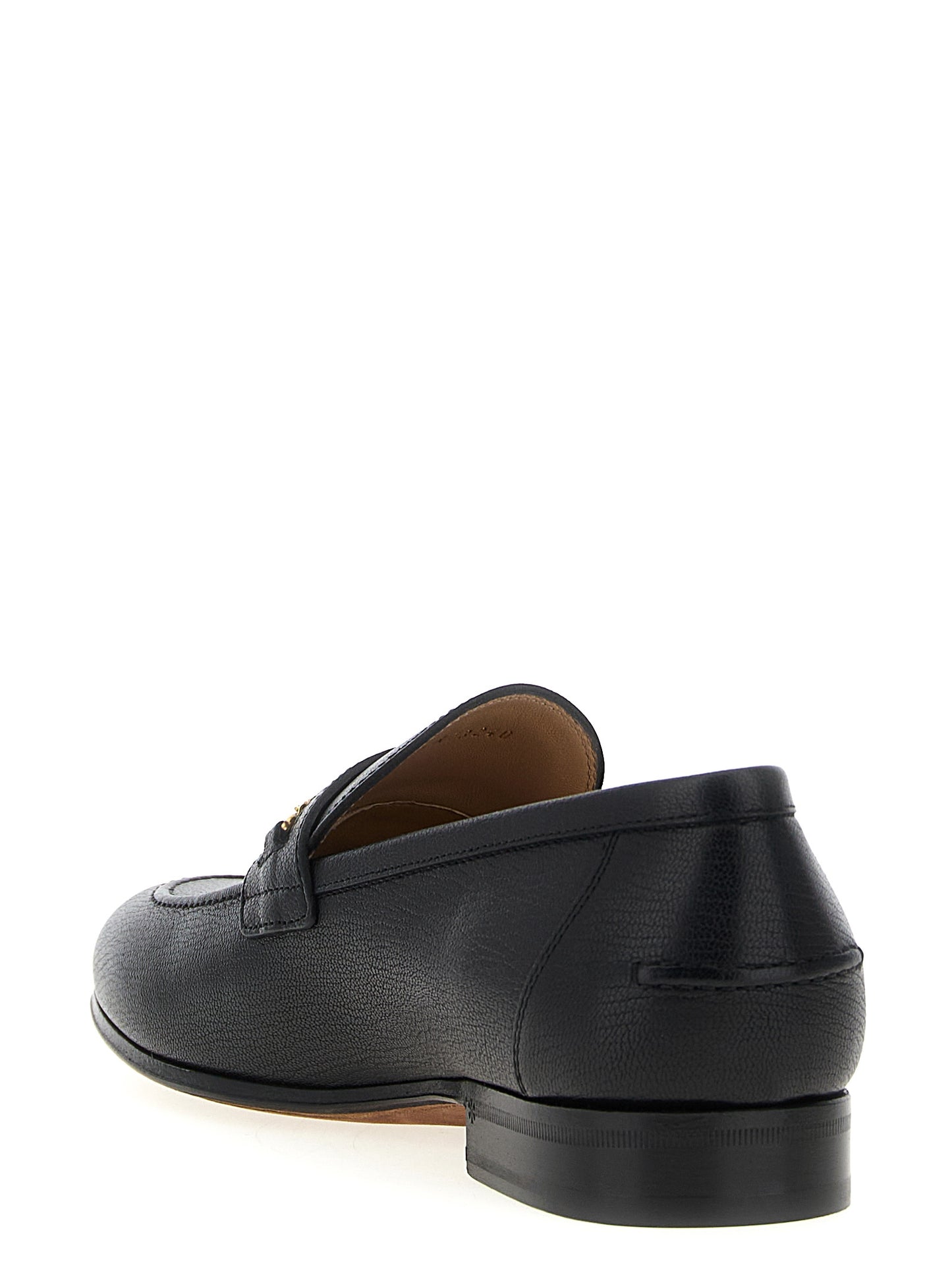 Loafer Slip-On Shoes by Valentino Garavani for men in goatskin leather black & signature features an effortless chic silhouette, showcasing the V Logo Men's Goatskin Leather Loafer Slip-On Shoes design with an effortless chic and a for a effortless chic look.
