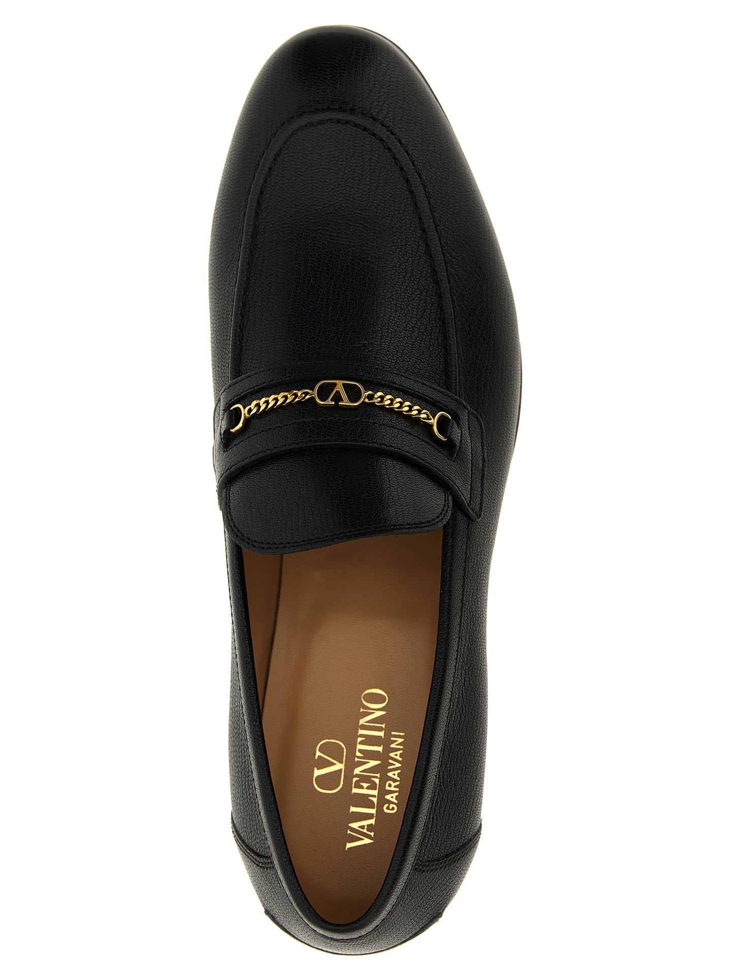 Loafer Slip-On Shoes by Valentino Garavani for men in goatskin leather black & signature features an dynamic silhouette from the V Logo Men's Goatskin Leather Loafer Slip-On Shoes collection, defined by a dynamic and for a dynamic look.
