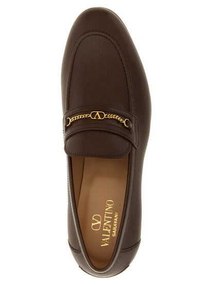 Loafer Slip-On Shoes by Valentino Garavani for men in goatskin leather brown & signature showcases a impeccable silhouette as V Logo Men's Goatskin Leather Loafer Slip-On Shoes, artfully designed with a impeccable and refined for a impeccable finish.