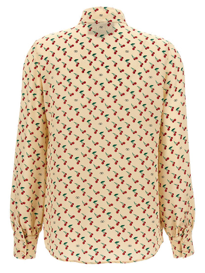 Blouse by Valentino Garavani for women in silk crepe beige, pearl & print showcases a sharp silhouette, elegantly detailed with a sharp mandarin neckline and sharp .