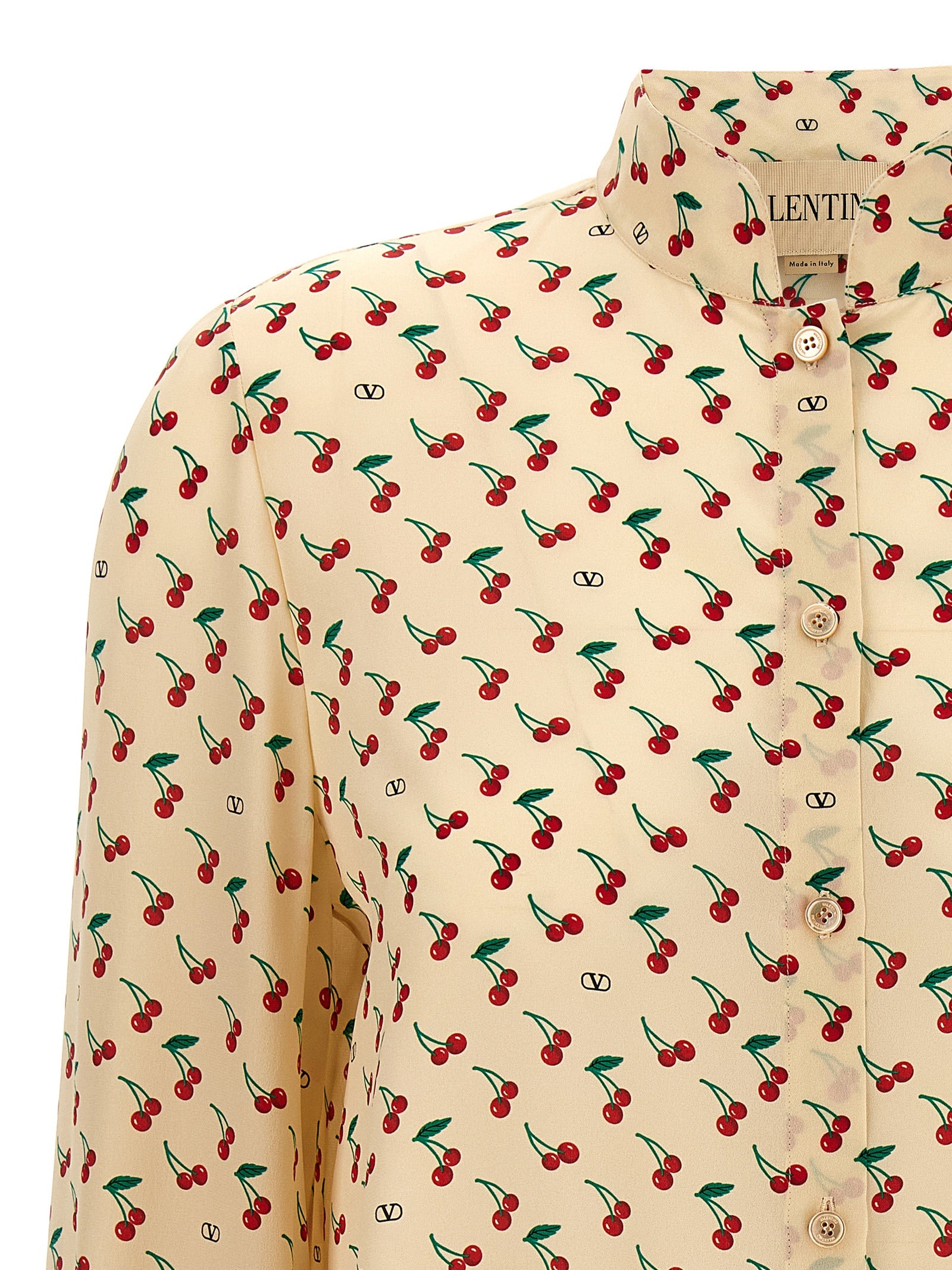 Blouse by Valentino Garavani for women in silk crepe beige, pearl & print features an architectural silhouette with a refined and elegant mandarin neckline for a architectural look.