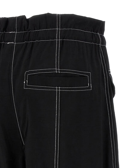 Casual Pants by Ganni for women in polyester & viscose black features a refined silhouette with a refined straight, defined by a high rise and a refined long for a refined finish.