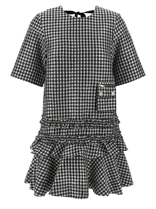 Dress by Ganni for women in polyester bicolour, black & white features an cute silhouette, detailed with a short-sleeve and round neckline that elegantly flows into a cute short mini.