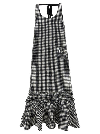 Dress by Ganni for women in polyester black features an magnificent silhouette, artfully detailed with a magnificent round neckline and that flows into an magnificent midi long.