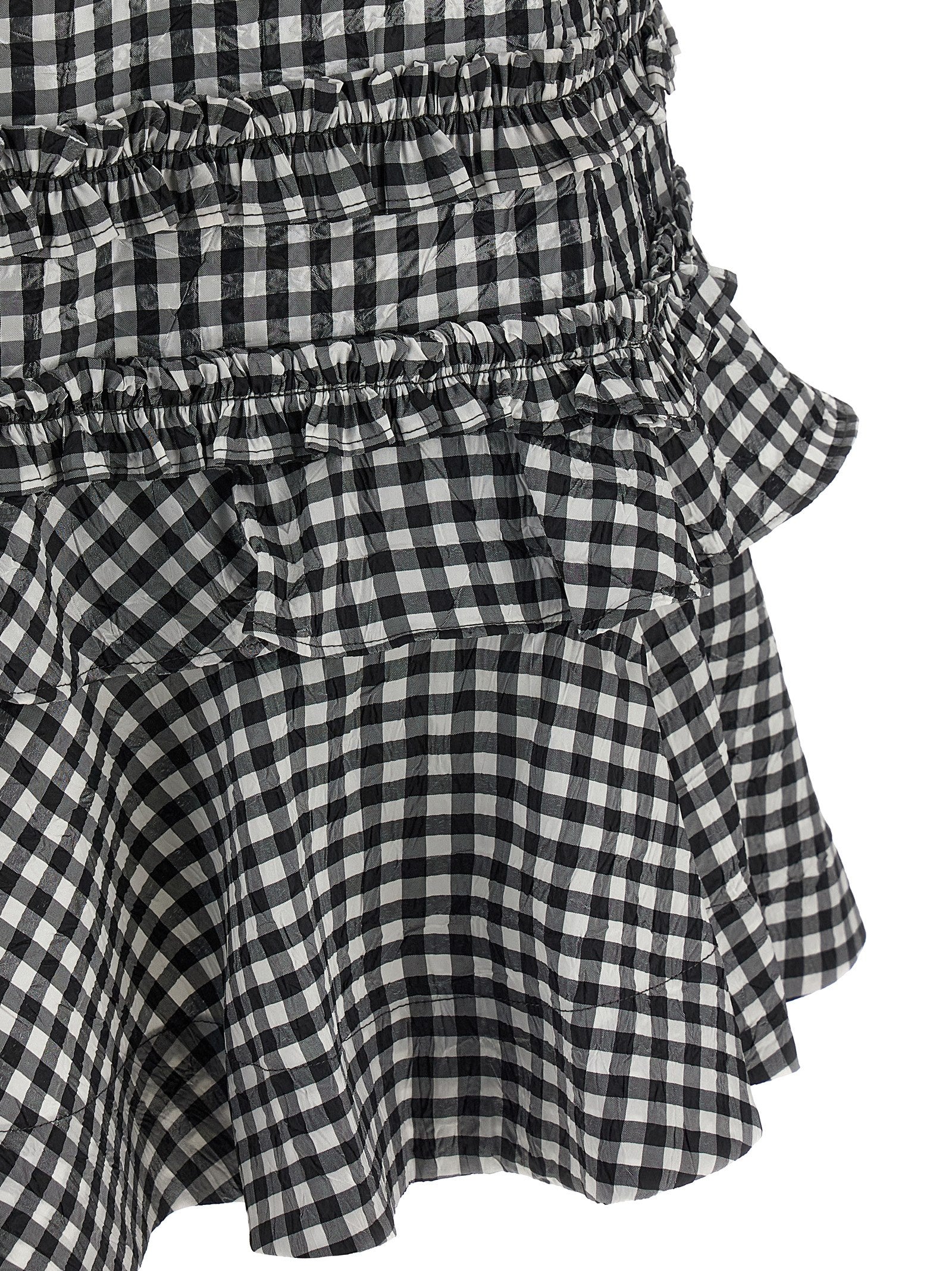 Dress by Ganni for women in polyester bicolour, black & white presents a sinuous silhouette, showcasing a sophisticated and detailed with a sinuous short mini for a refined finish.