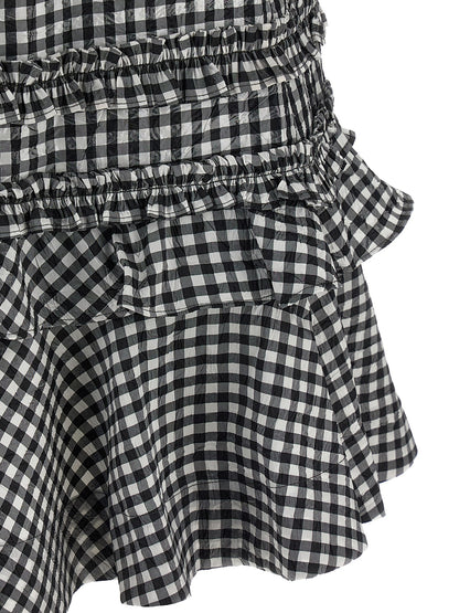 Dress by Ganni for women in polyester bicolour, black & white presents a sinuous silhouette, showcasing a sophisticated and detailed with a sinuous short mini for a refined finish.