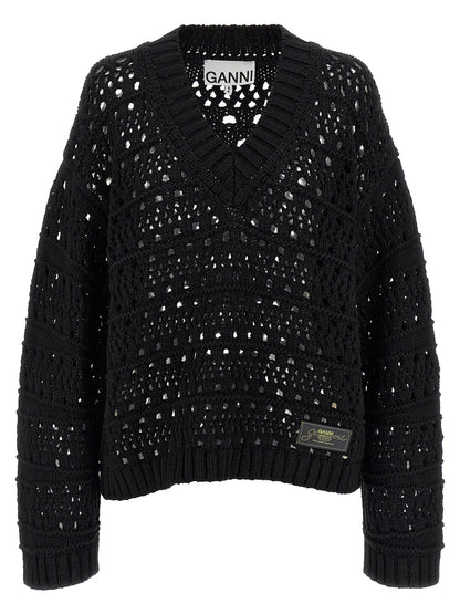 Cardigan by Ganni for women in cotton black showcases a luxurious silhouette, meticulously detailed with a sophisticated v-neck neckline and long-sleeve for a refined finish.