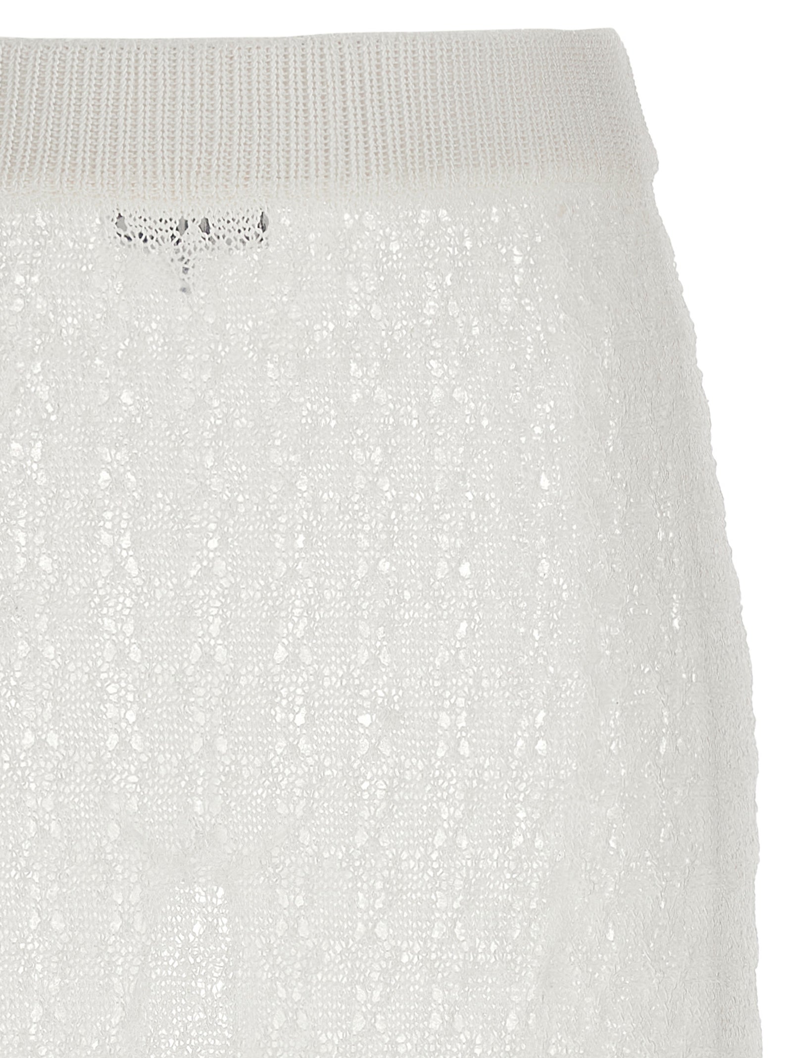 Skirt by Ganni for women in polyamide white features a contoured silhouette from the Crochet Women's Polyamide Mini Skirt collection, characterized by its contoured mini for a contoured finish.