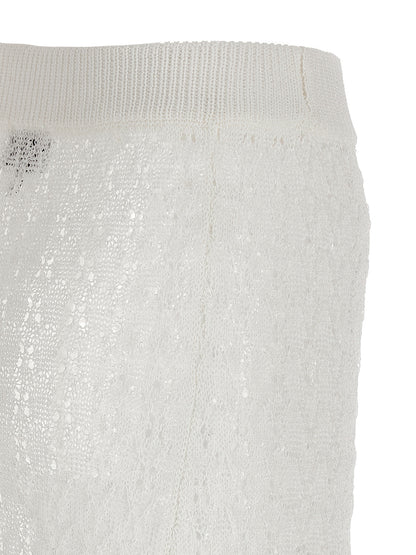 Skirt by Ganni for women in polyamide white features an tailored silhouette, artfully capturing the essence of Crochet Women's Polyamide Mini Skirt in a sophisticated mini.