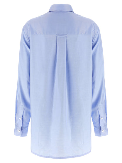 Blouse by Brioni for women in cotton twill light-blue presents a discerning silhouette, showcasing a sophisticated and for a truly discerning finish.